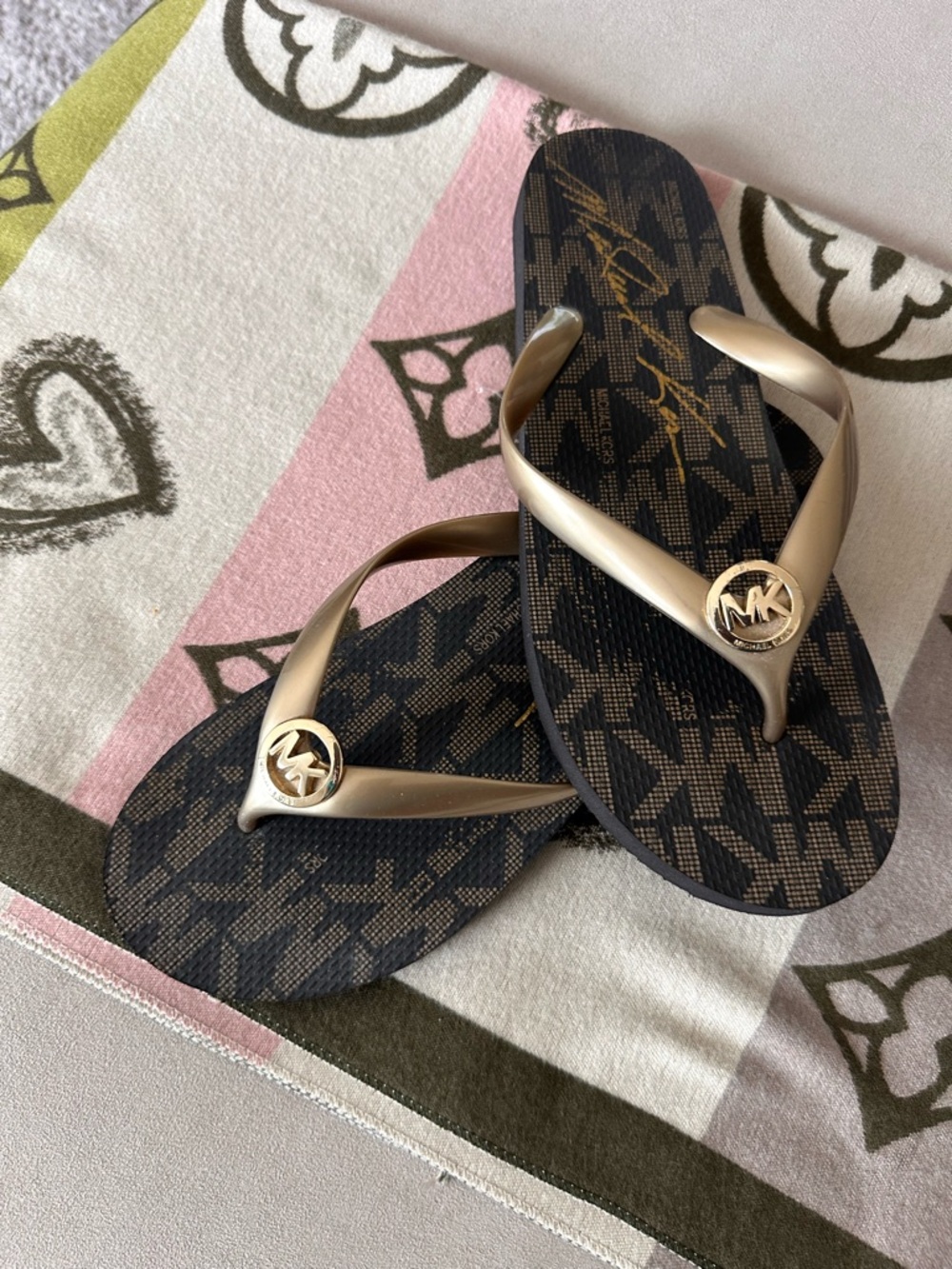 Michael Kors Black Patterned Flip Flops with Gold Straps